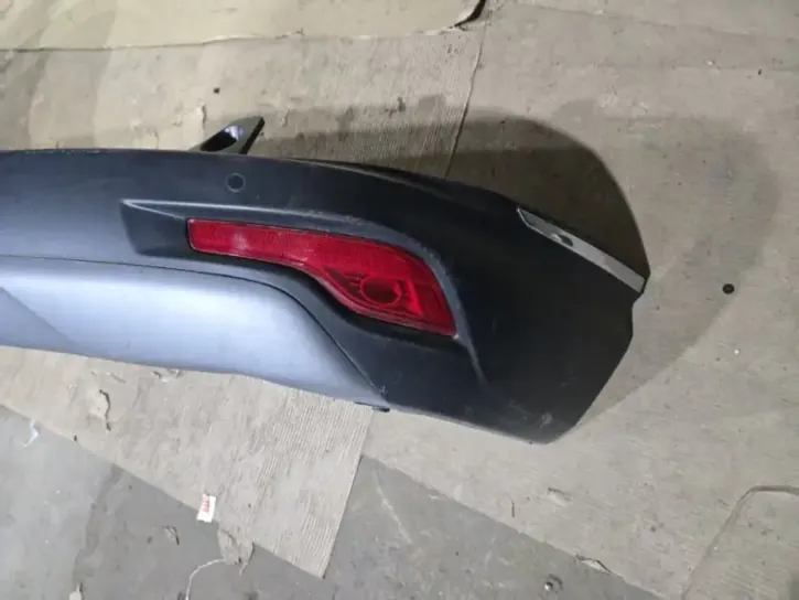 Задний бампер Honda CRV 5 поколения RW в отличном состоянии, вид сбоку
