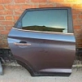 Дверь Hyundai Tucson NX4 TL после дефектовки на складе