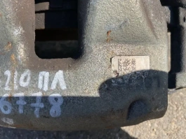 Суппорт тормозной toyota corolla e210  2018- перед. лев.